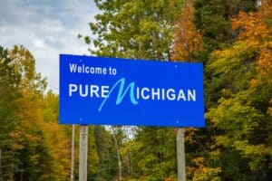 Vibrant fall foliage along a Northern Michigan lake