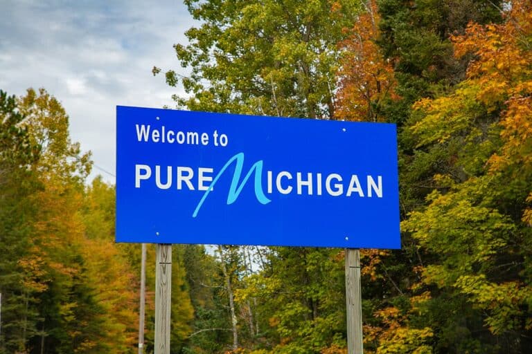 Vibrant fall foliage along a Northern Michigan lake