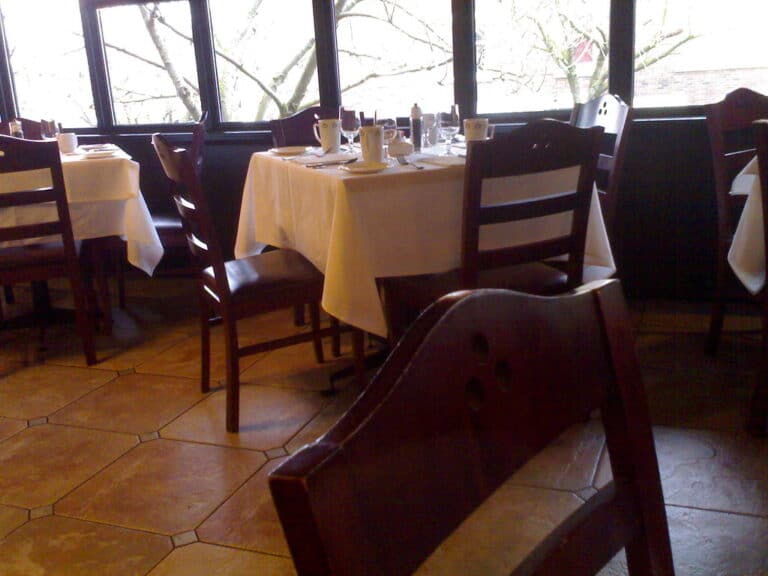 Candlelit Italian restaurant interior with warm ambiance