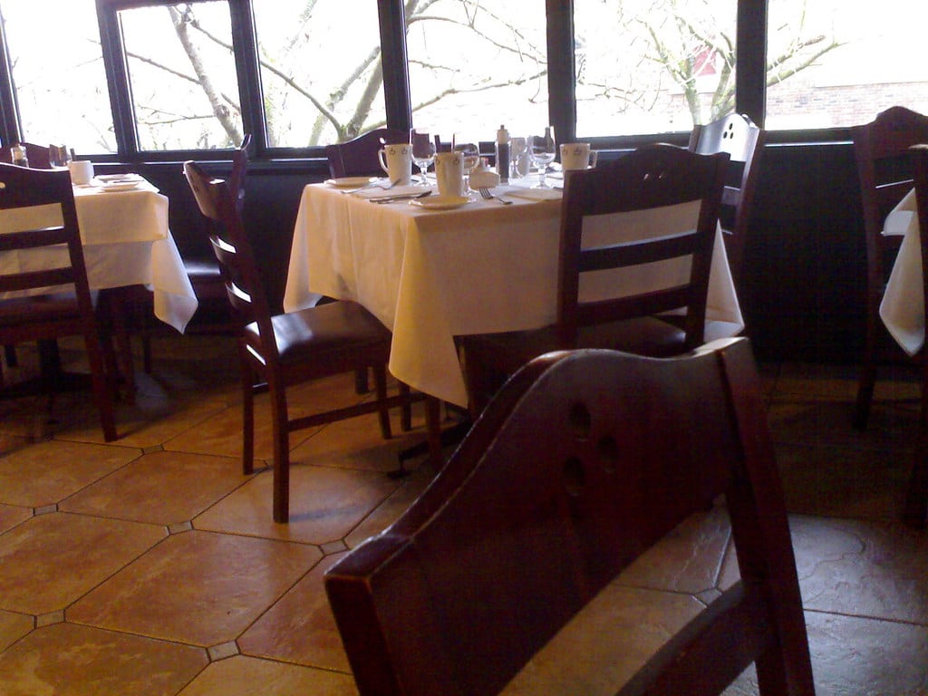 Candlelit Italian restaurant interior with warm ambiance